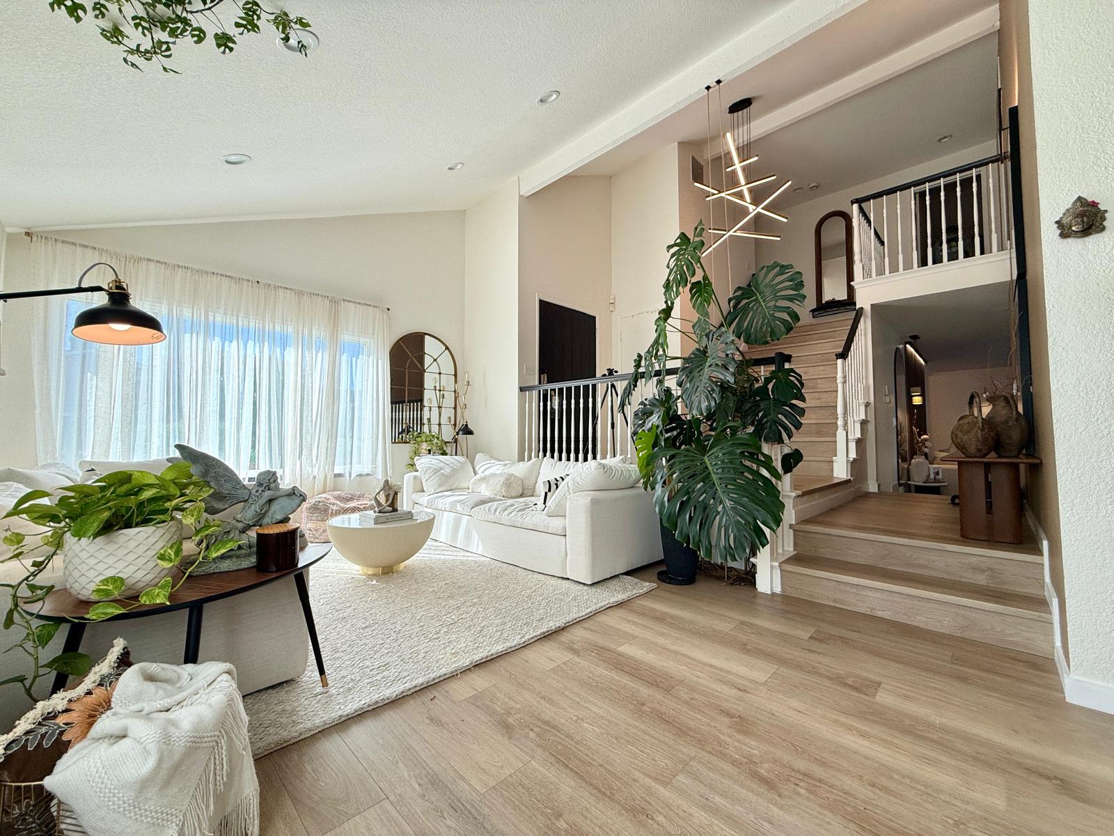 Living room after the transformation from the same open-room perspective